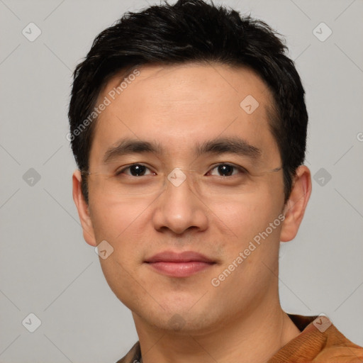 Joyful white young-adult male with short  black hair and brown eyes