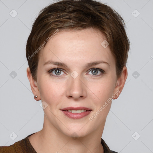 Joyful white young-adult female with short  brown hair and grey eyes