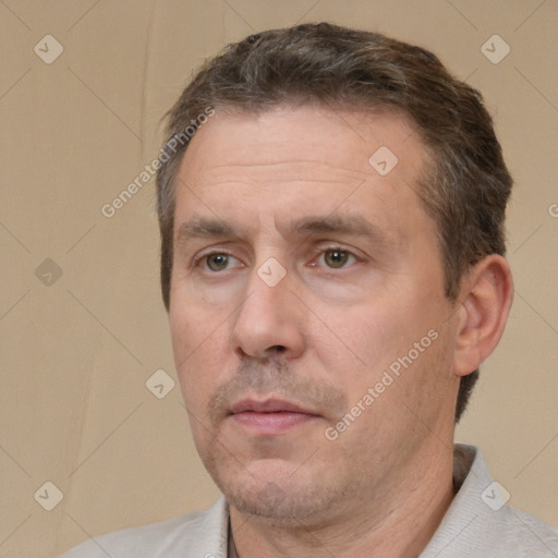 Neutral white adult male with short  brown hair and brown eyes