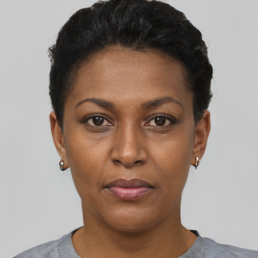 Neutral black young-adult female with short  black hair and brown eyes