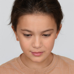 Joyful white child female with short  brown hair and brown eyes