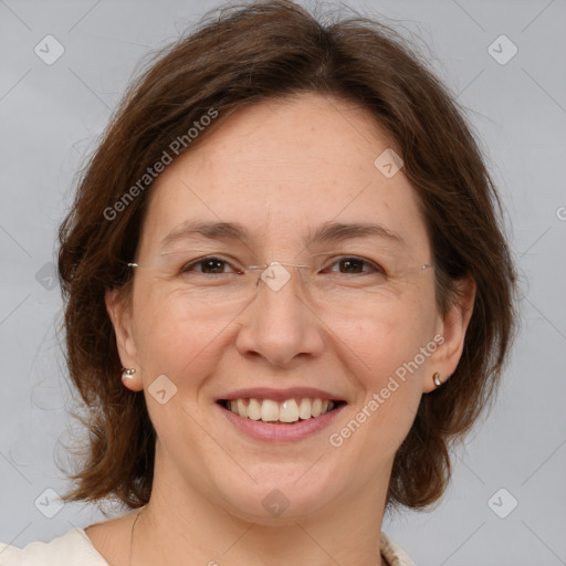 Joyful white adult female with medium  brown hair and brown eyes