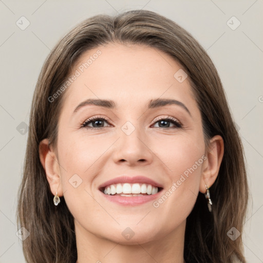 Joyful white young-adult female with medium  brown hair and grey eyes