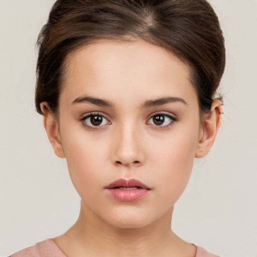 Neutral white young-adult female with short  brown hair and brown eyes