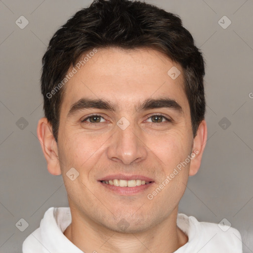 Joyful white young-adult male with short  brown hair and brown eyes