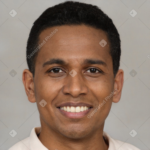 Joyful latino young-adult male with short  brown hair and brown eyes