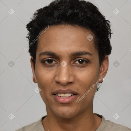 Joyful black young-adult male with short  black hair and brown eyes