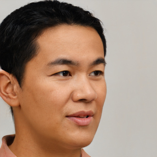 Neutral asian young-adult male with short  brown hair and brown eyes