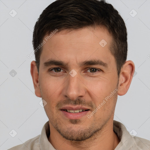 Joyful white young-adult male with short  brown hair and brown eyes