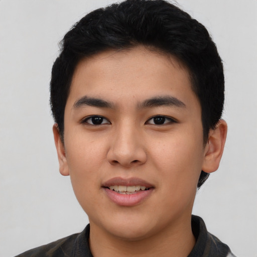 Joyful asian young-adult male with short  black hair and brown eyes