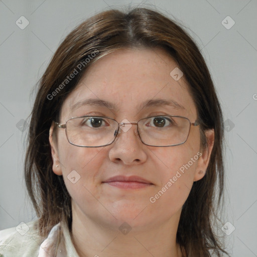 Joyful white adult female with medium  brown hair and brown eyes