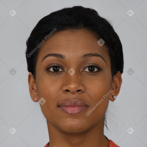Joyful black young-adult female with short  brown hair and brown eyes