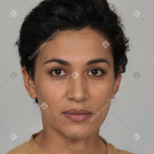 Joyful latino young-adult female with short  brown hair and brown eyes