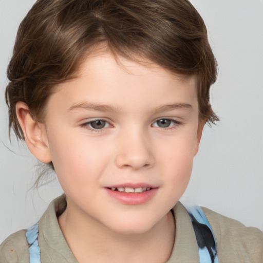 Joyful white child male with medium  brown hair and brown eyes