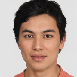 Joyful asian young-adult male with short  brown hair and brown eyes