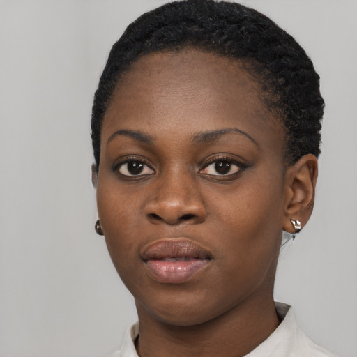 Neutral black young-adult female with short  black hair and brown eyes