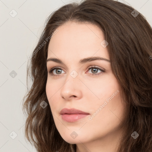 Neutral white young-adult female with long  brown hair and brown eyes