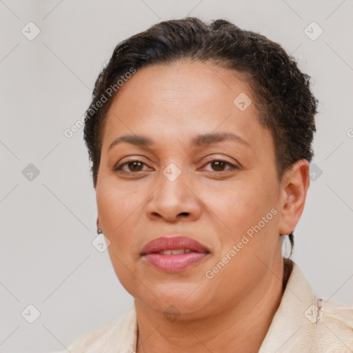 Joyful white adult female with short  brown hair and brown eyes