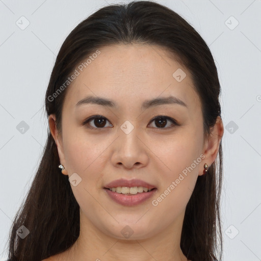 Joyful asian young-adult female with long  brown hair and brown eyes