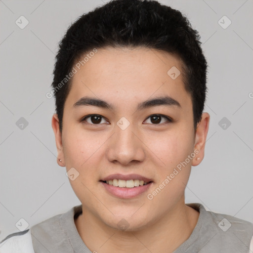 Joyful asian young-adult male with short  brown hair and brown eyes