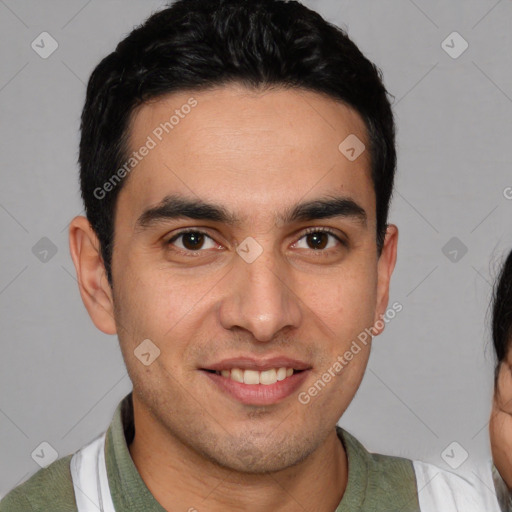 Joyful white young-adult male with short  brown hair and brown eyes