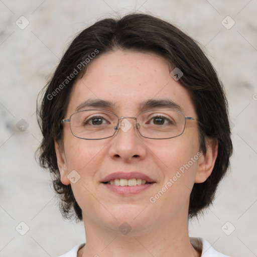 Joyful white adult female with medium  brown hair and brown eyes