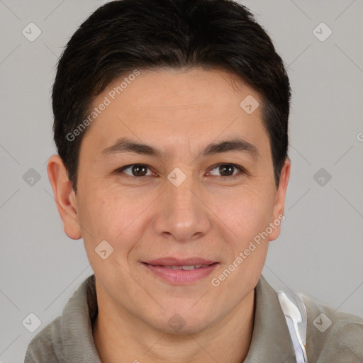 Joyful white adult male with short  brown hair and brown eyes