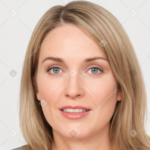 Joyful white young-adult female with long  brown hair and blue eyes