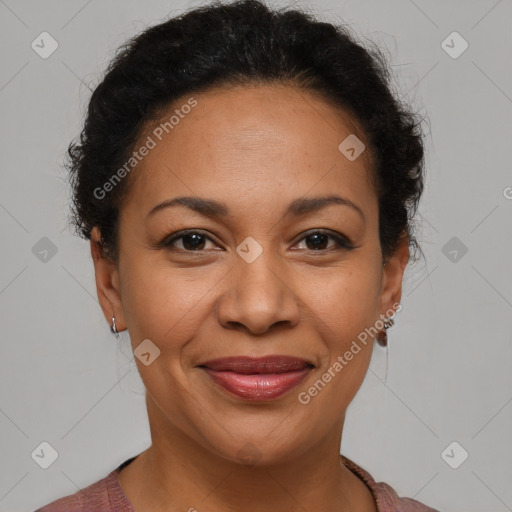 Joyful latino adult female with short  brown hair and brown eyes