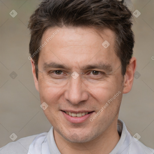 Joyful white adult male with short  brown hair and brown eyes