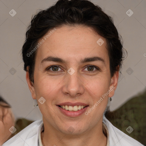 Joyful white adult female with short  brown hair and brown eyes