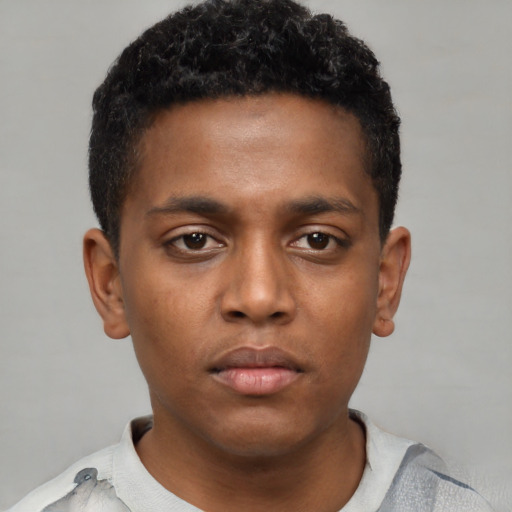 Neutral black young-adult male with short  brown hair and brown eyes