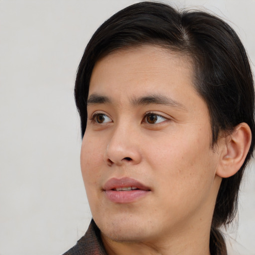 Neutral asian young-adult male with medium  brown hair and brown eyes
