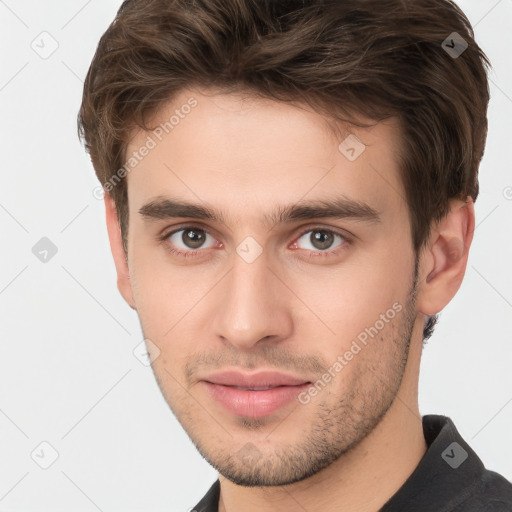 Neutral white young-adult male with short  brown hair and brown eyes