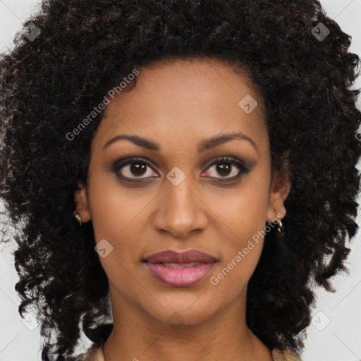 Joyful black young-adult female with long  brown hair and brown eyes