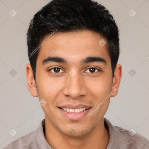 Joyful latino young-adult male with short  brown hair and brown eyes