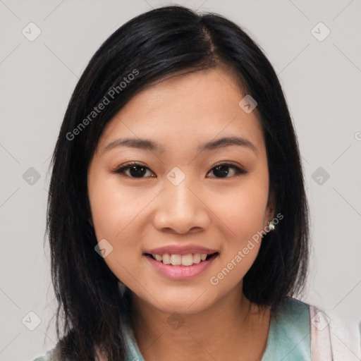 Joyful asian young-adult female with medium  black hair and brown eyes