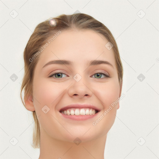 Joyful white young-adult female with medium  brown hair and green eyes