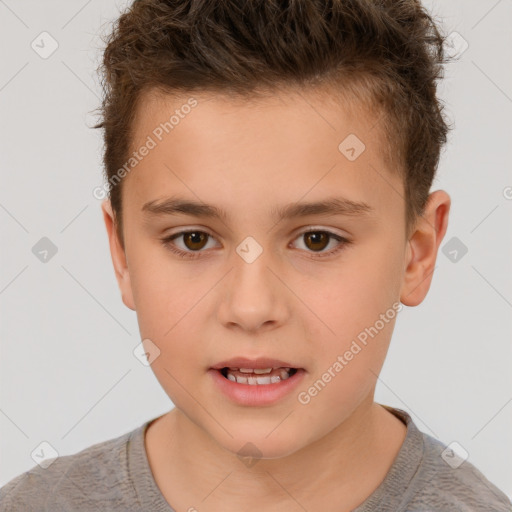 Joyful white child male with short  brown hair and brown eyes