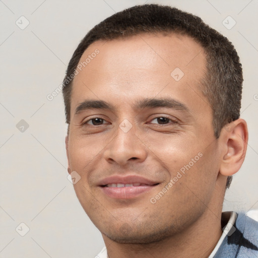 Joyful white young-adult male with short  brown hair and brown eyes