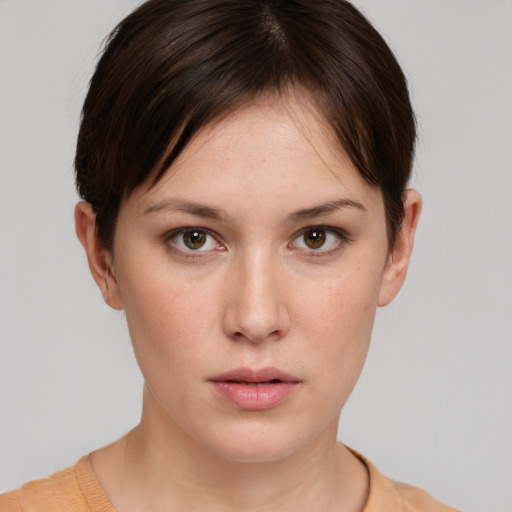 Neutral white young-adult female with short  brown hair and brown eyes