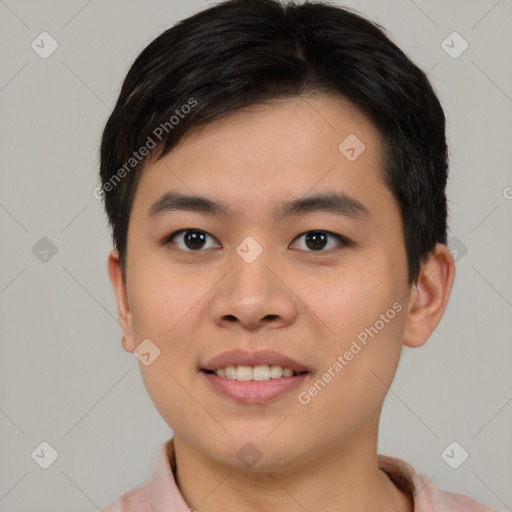 Joyful asian young-adult male with short  brown hair and brown eyes