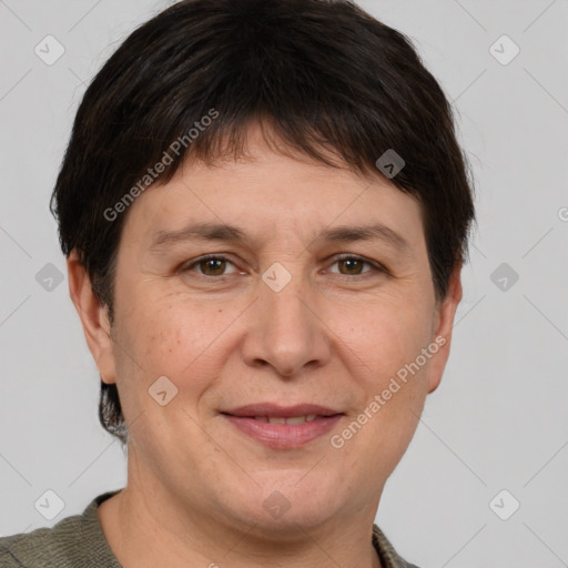 Joyful white adult female with short  brown hair and brown eyes