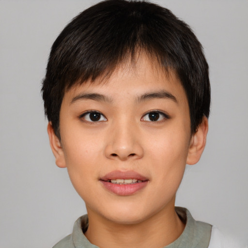 Joyful asian young-adult female with short  brown hair and brown eyes