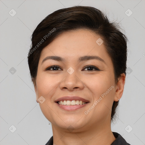 Joyful white young-adult female with medium  brown hair and brown eyes