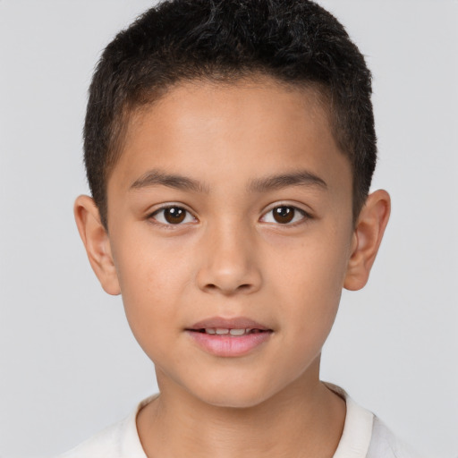 Joyful white child male with short  brown hair and brown eyes