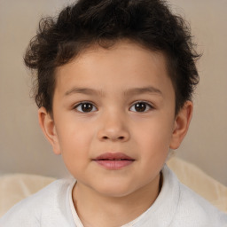 Joyful white child male with short  brown hair and brown eyes