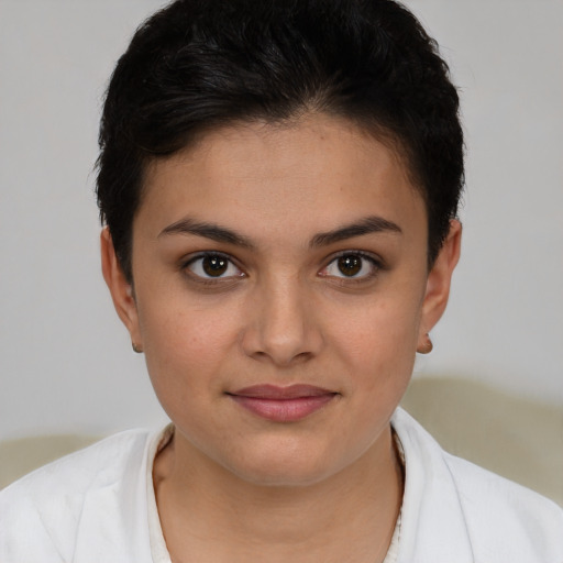 Joyful white young-adult female with short  brown hair and brown eyes