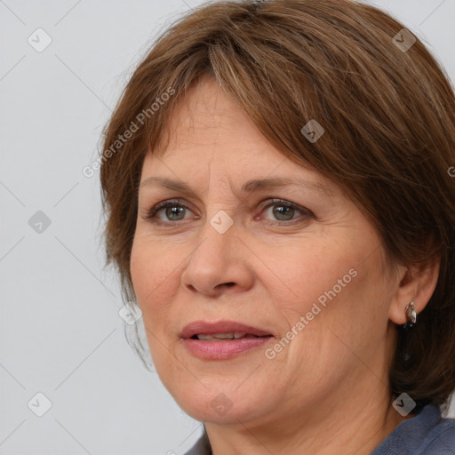 Joyful white adult female with medium  brown hair and grey eyes