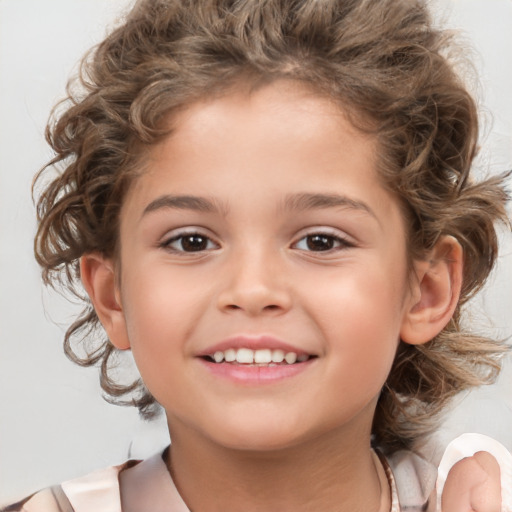 Joyful white child female with medium  brown hair and brown eyes